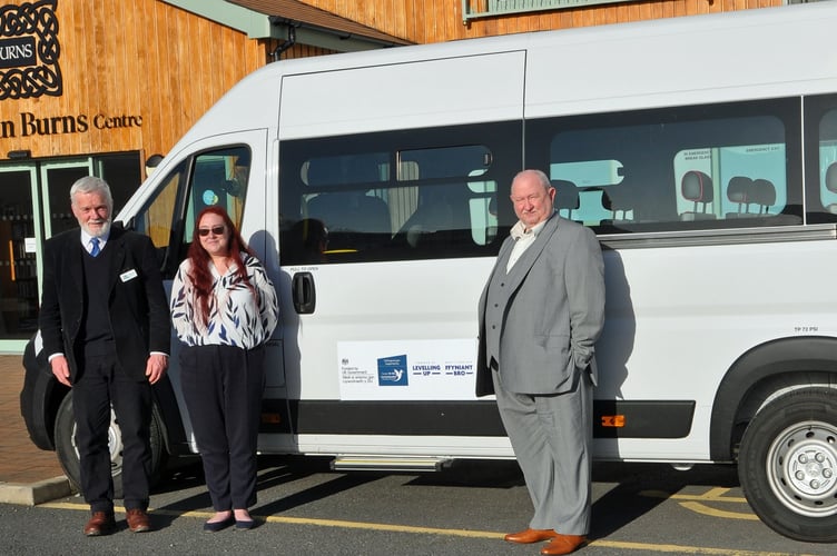 Dolen Teifi Community Transport\'s 17-seater minibus for the Gwendraeth Valley, with Llannon community councillor Gary Jones (right), Carmarthenshire councillor for Llannon Dot Jones, and Tom Cowcher (left), chairman of Llandysul a Phont Tyweli Ymlae