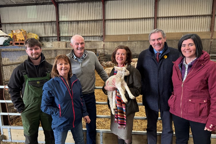 Pictured (L-R) the host family of Daniel Evans, Eryl Evans and Dai Charles Evans; First Minister of Wales, Eluned Morgan MS; NFU Cymru President, Aled Jones; and NFU Cymru Deputy President, Abi Reader