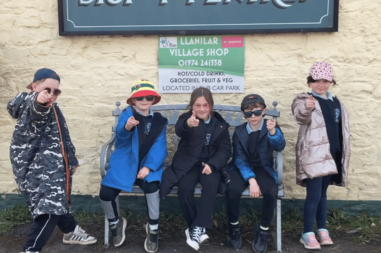 Some of the Ysgol Llanilar pupils who are fed up of dog poo in the village