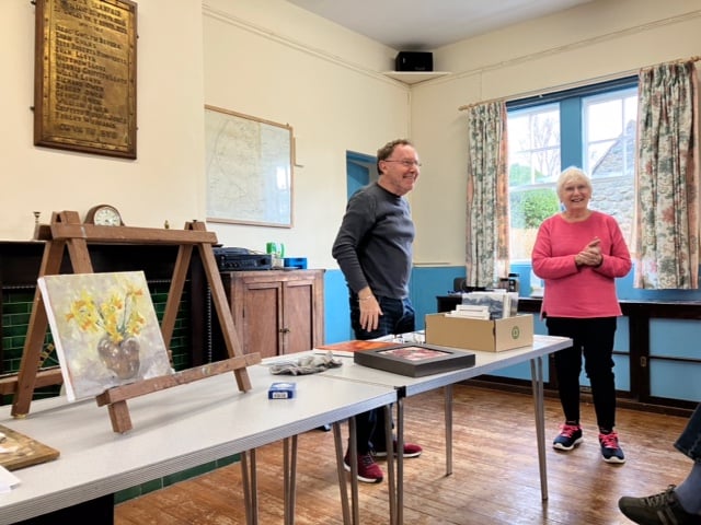 Artist David Grosvenor and Llanfair art group Chair, Marion Wagstaff